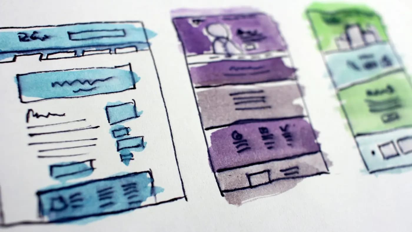 Hand-drawn website wireframes in watercolour