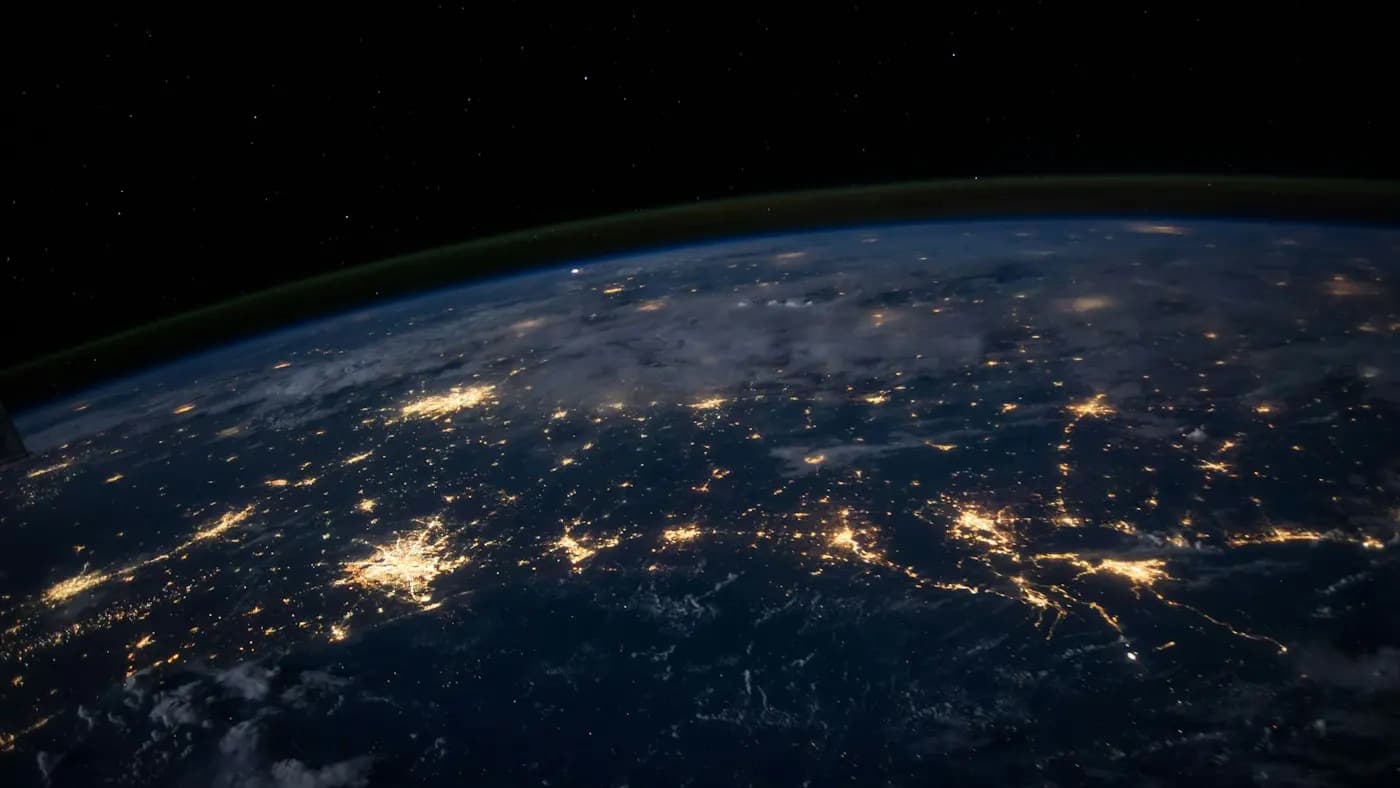 Night view of Earth from space showing city lights